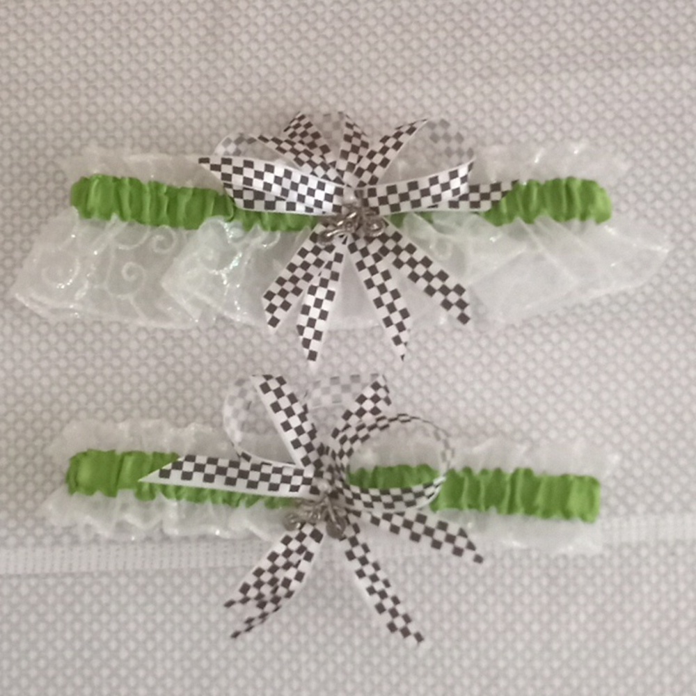 Wedding garter set. White and green with checkered trim and dirt bike charm.